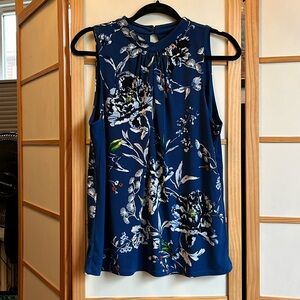 White House black market. Medium. Floral blue blouse.
